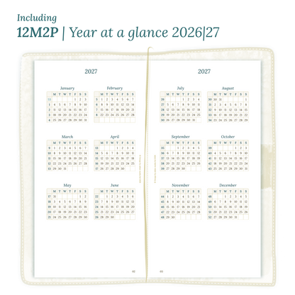 Open planner showing details of the PDF printable inserts module 12M1P 12 months on 1 page for 2026 & 2027 inside this Bundle for Standard size Traveler's Notebook planner.