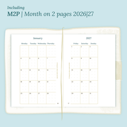 Open planner showing details of the PDF printable planner inserts module M2P month on 2 pages for 2026 and 2027 inside this Bundle XL in Passport size for Traveler's Notebook.