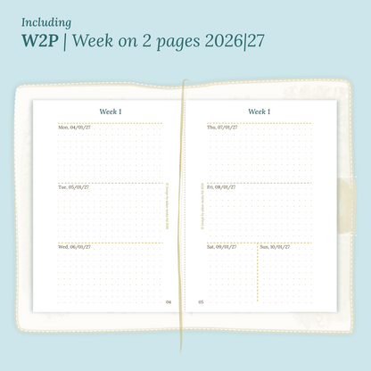 Open planner showing details of the PDF printable planner inserts module W2P week on 2 pages for 2026 and 2027 inside this Bundle XL in Passport size for Traveler's Notebook.
