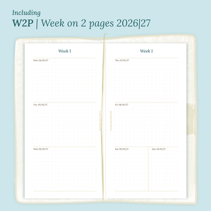 Open planner showing details of the PDF printable planner inserts module W2P week on 2 pages for 2026 and 2027 inside this Bundle XL in Standard size for Traveler's Notebook.