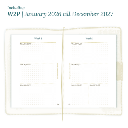 Open planner showing details of the PDF printable planner inserts module W2P week on 2 pages for 2026 and 2027 for Passport size Traveler's Notebook planner.